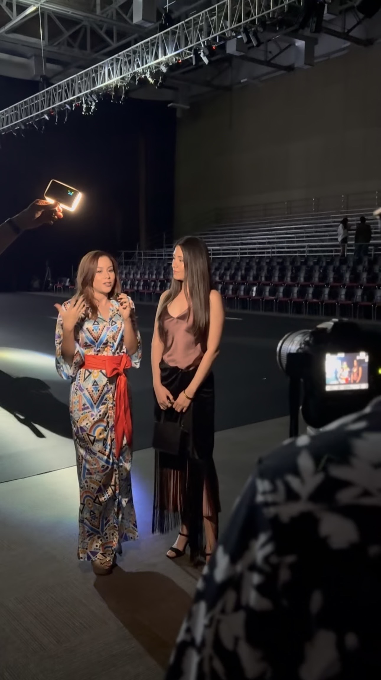 Lu collaborating with designers at an international fashion event